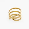 ANILLO LINE TWIST · ACERO BAÑO ORO