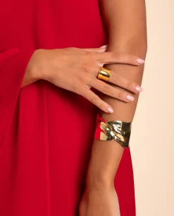 BRAZALETE CROSS LEAF · BAÑO ORO