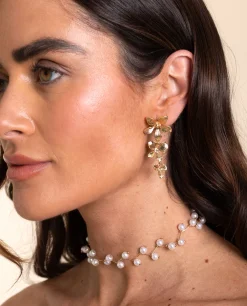 PENDIENTES DANGLE BLOOM · BAÑO ORO