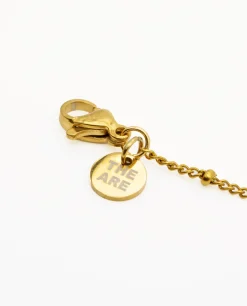 TOBILLERA STORIES · ACERO BAÑO ORO